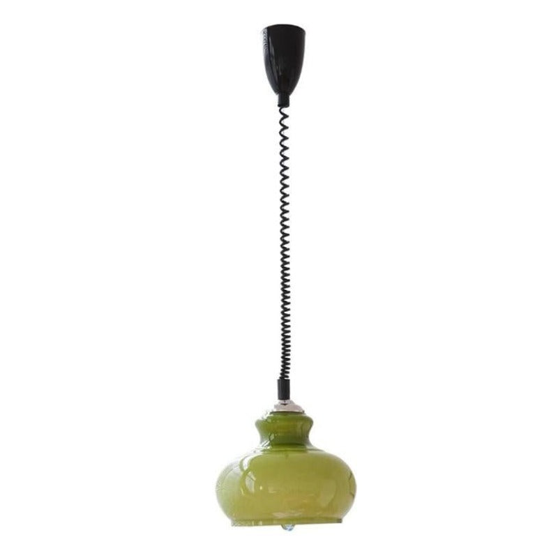 Green glass dome below long dark spiral suspension
