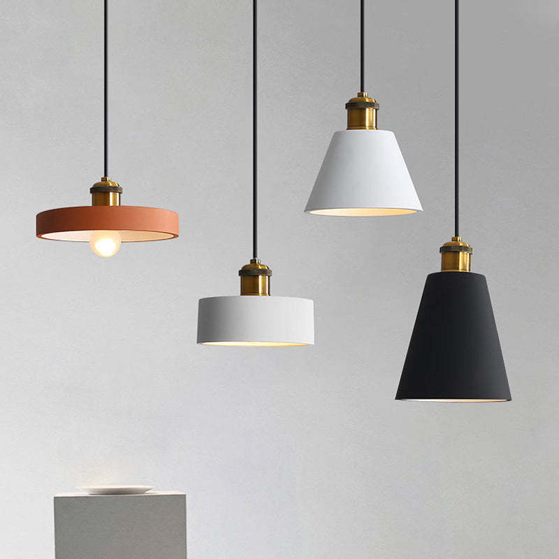 Morandi display with orange disc, white flared, grey drum and black tapered shades.