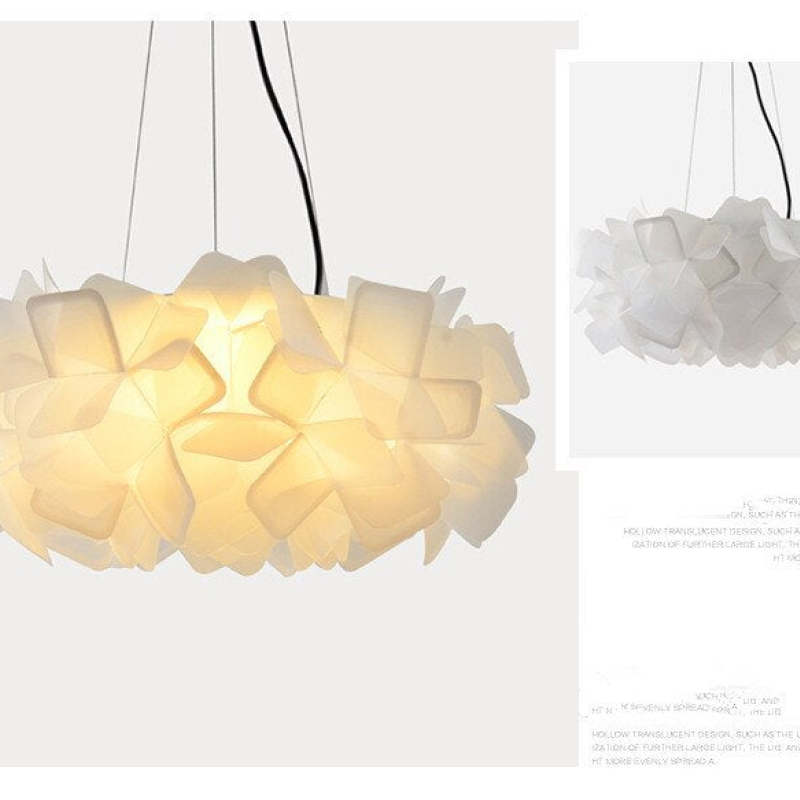 White Bella layered-petal pendant composite with a warm-glowing main example and an unlit inset