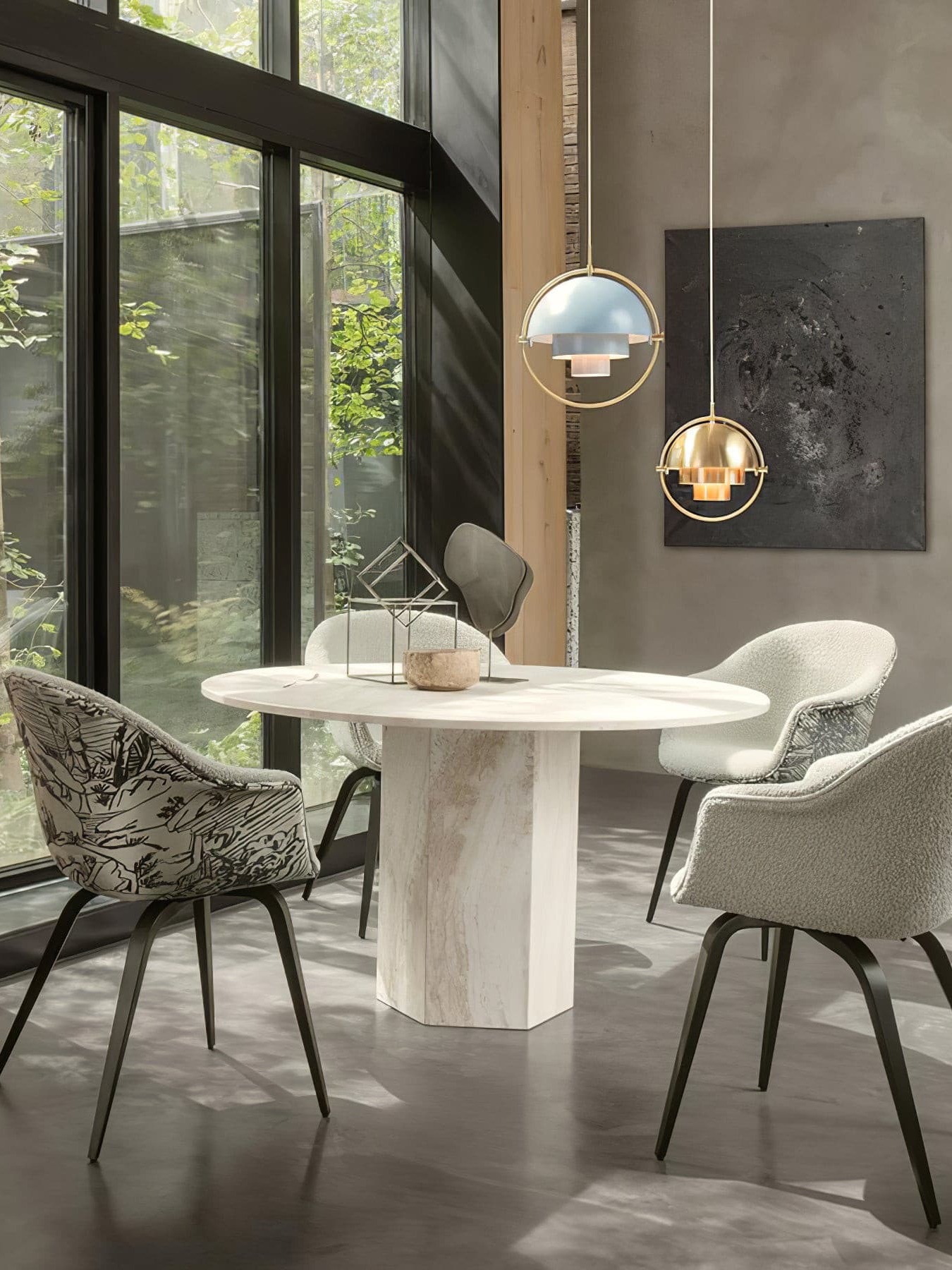 White and copper-finish pendants beside tall windows