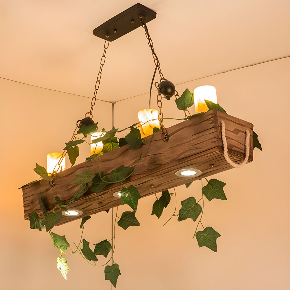 Underside view of Austin beam pendant showing round downward light openings beneath the upper candle-style lights.