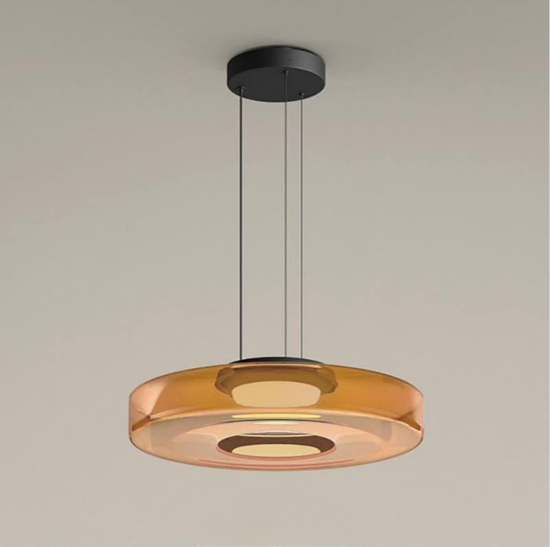 Amber single-layer glass pendant with dark ceiling canopy