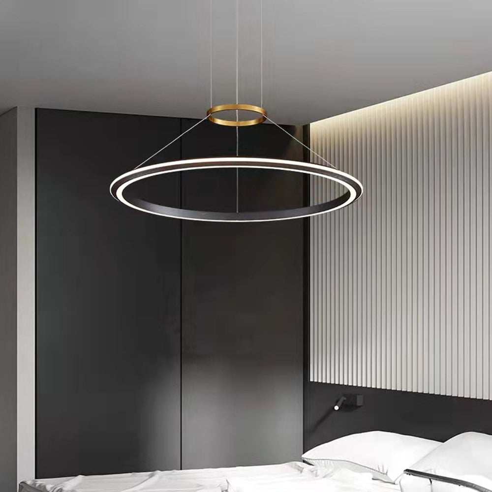 Arisha single-ring pendant pictured above a bed