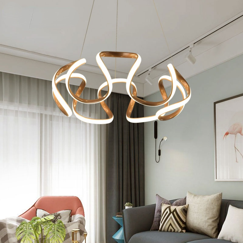 Coffee-toned six-head pendant in a seating room