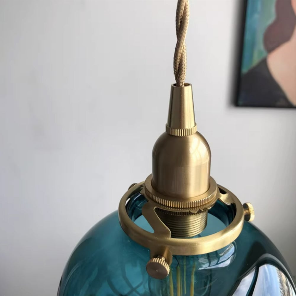 Close blue-green glass shade, metal fitting and cord