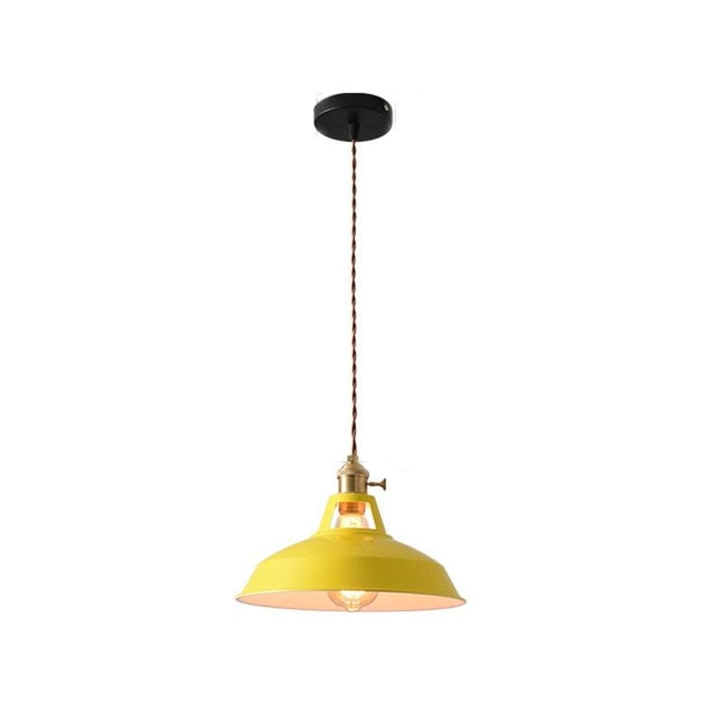 Yellow metal dome pendant with twisted brown cord, gold-coloured top fitting and black canopy