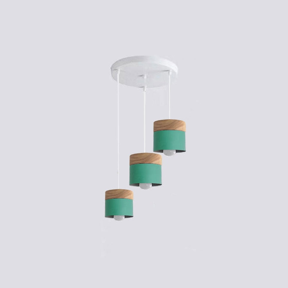 Three green wood-accent cylindrical heads at staggered heights below a white round canopy