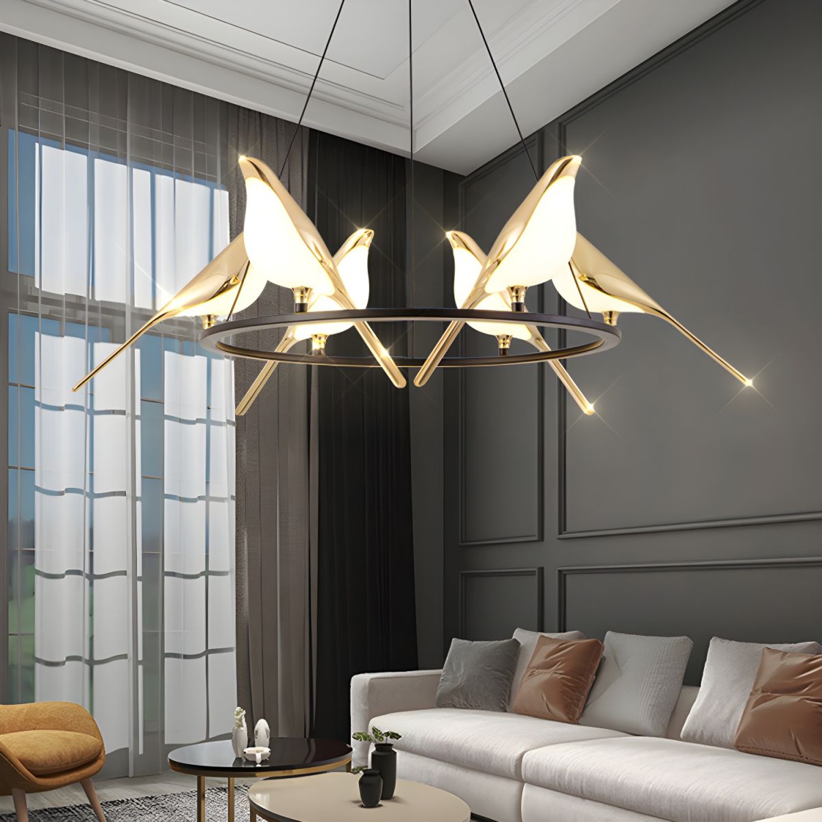 Bird ring pendant above living-room sofa and coffee table