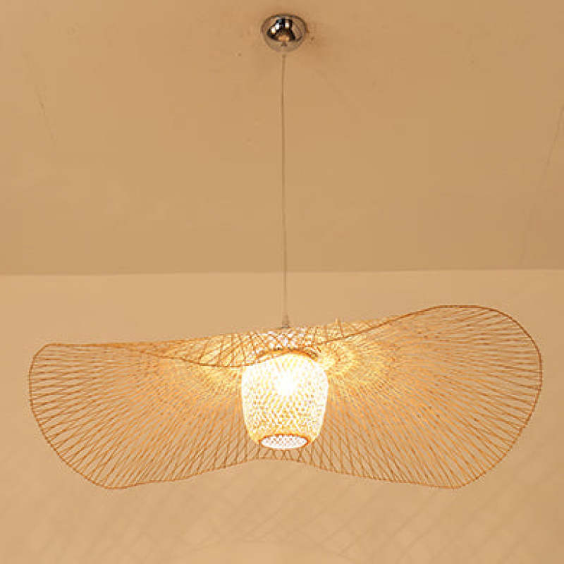 Lit wavy woven shade and central basket suspended from a polished canopy against a beige ceiling