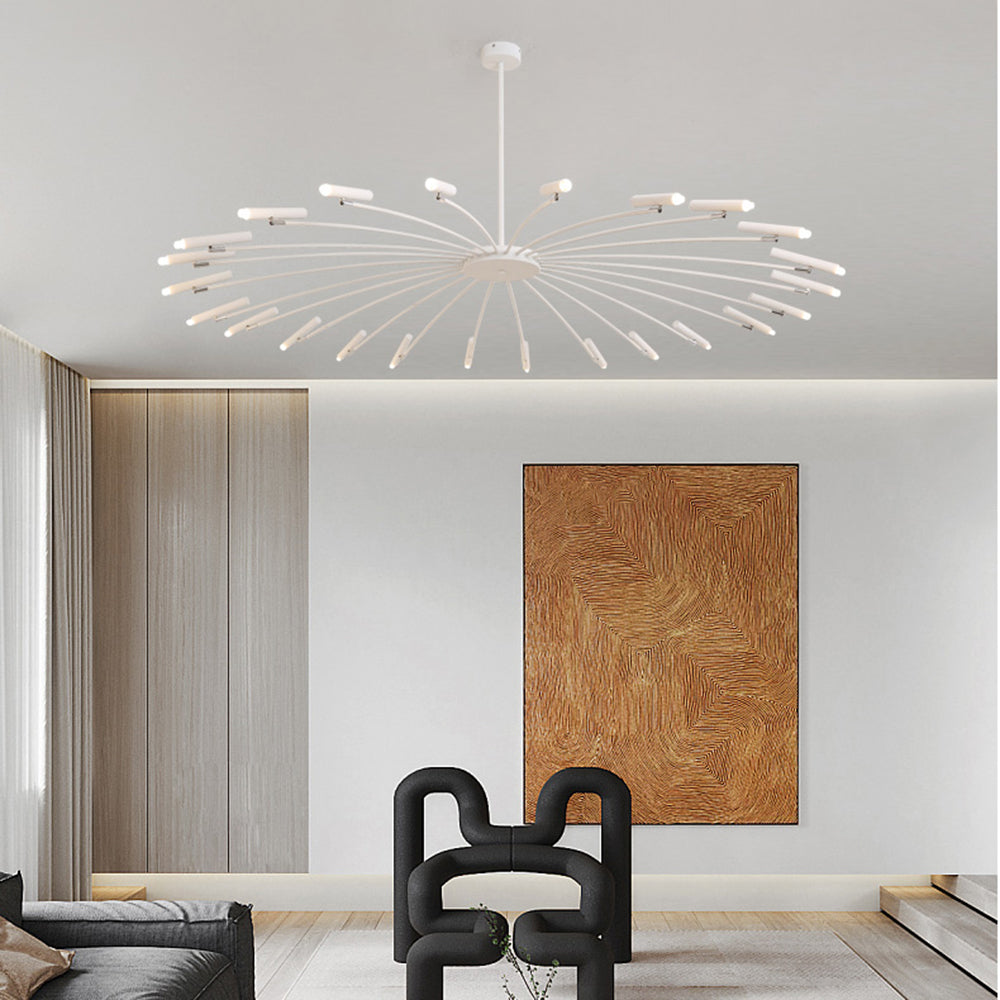 White Evette horizontal-head chandelier above a black sculptural chair and wood-textured wall artwork