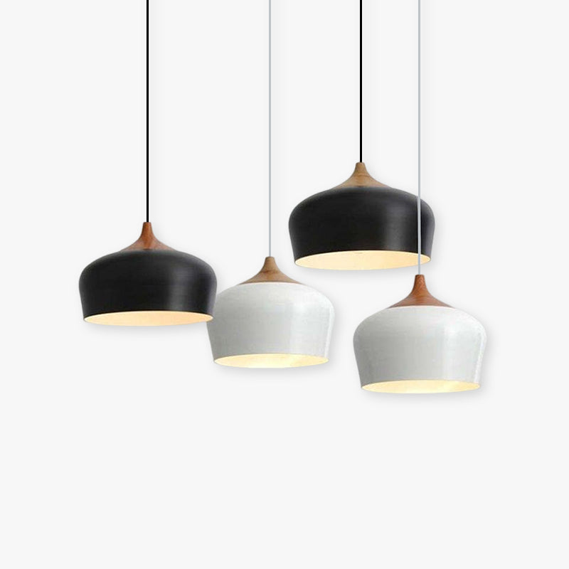 Black and white Nazifa pendants hanging in a group at different heights.