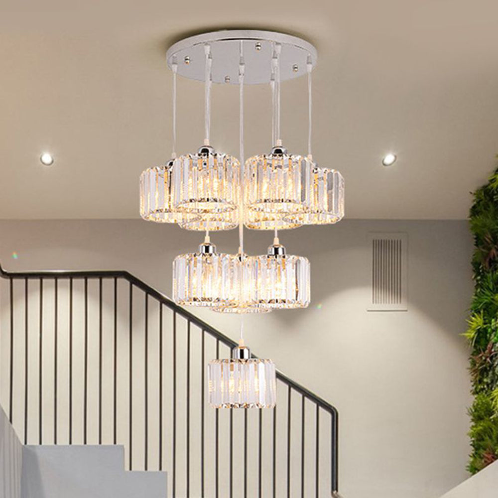 Tiered crystal column pendant cluster in stairwell