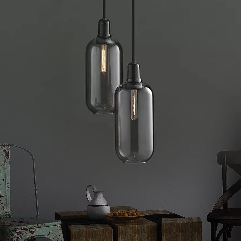 Tall smoke-gray pendants hanging at different heights