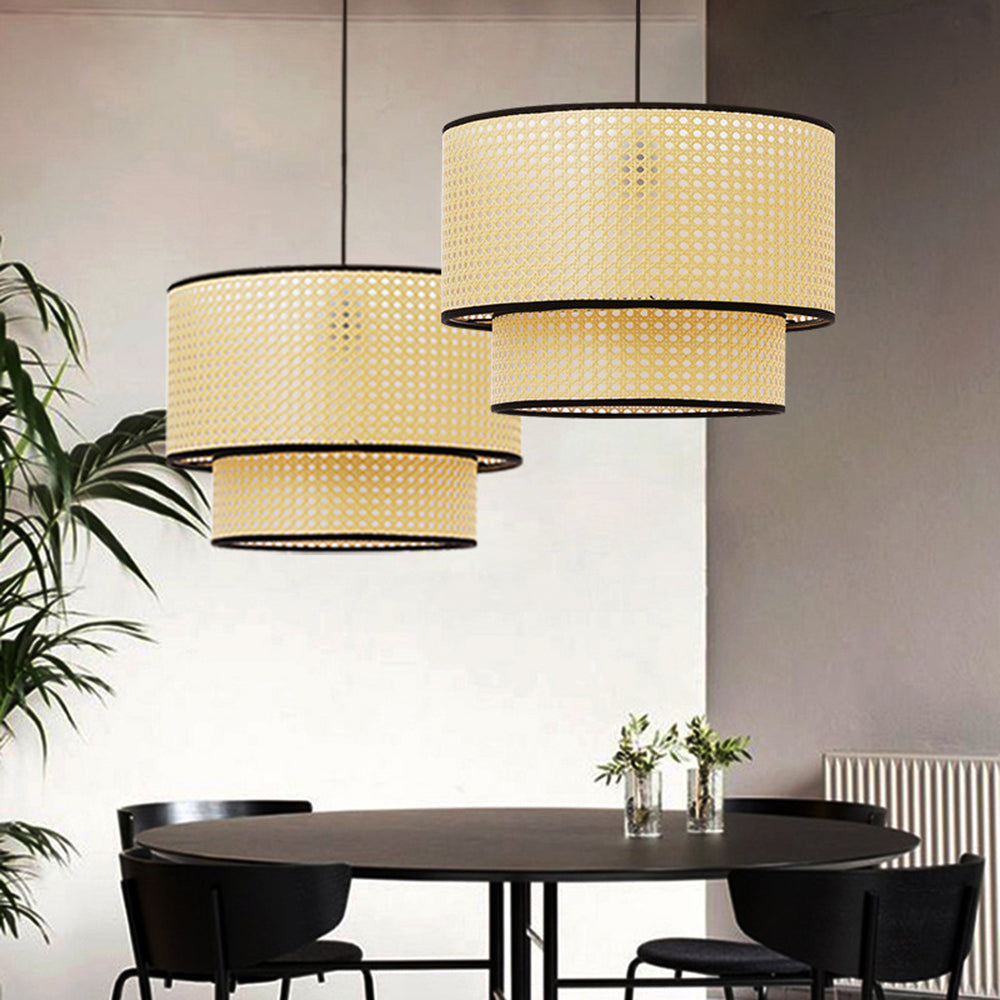 Two Ritta woven pendants pictured above a table