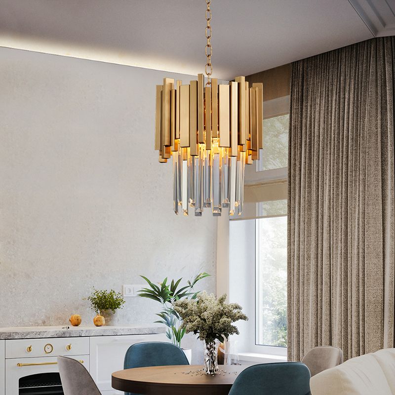 Gold crystal pendant in a living and dining space