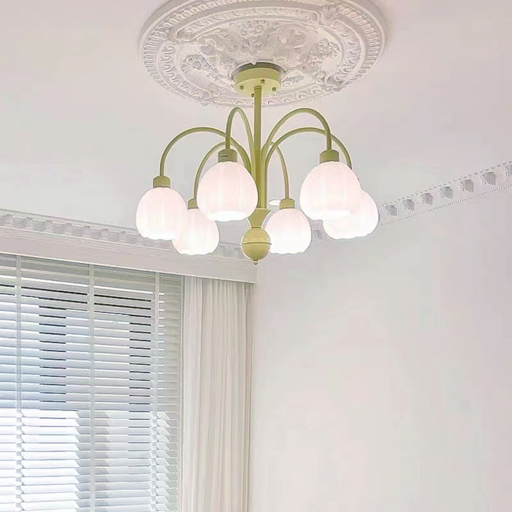Lily green multi-arm light mounted beneath a decorative ceiling rose