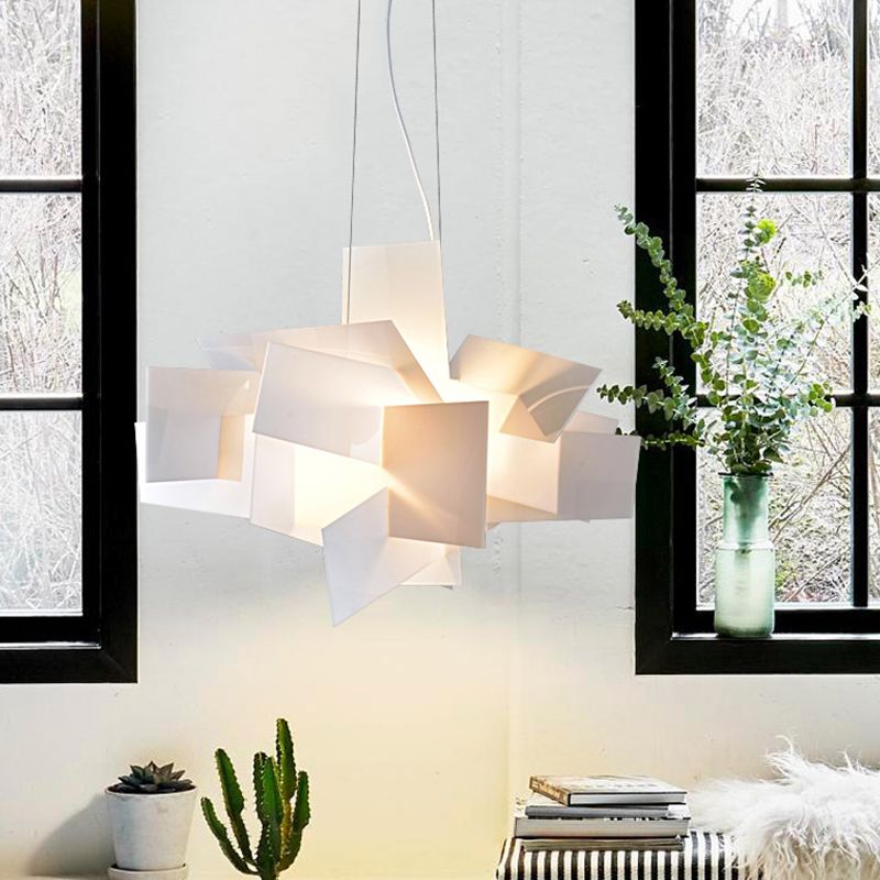 Renée white pendant beside black window frames and a table