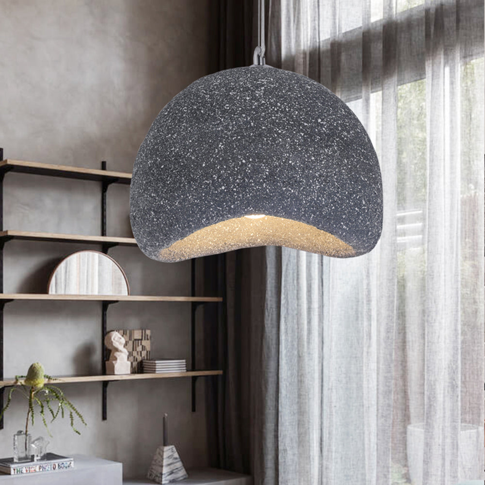 Gray Byers pendant beside shelving and a curtained window
