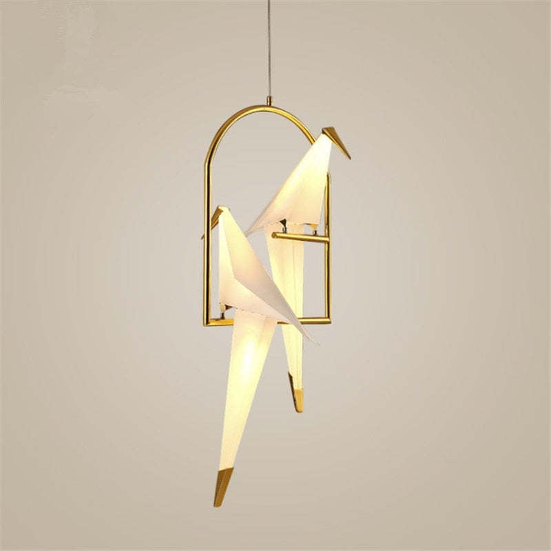 Two angular bird lights perched at different heights inside an arched frame.