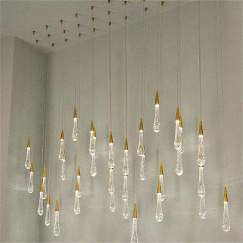 Large multi-drop crystal installation in pale interior