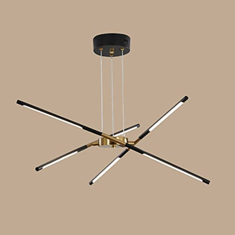 Black and Gold six-head Edge pendant with three double-ended rods, round canopy and suspension lines against tan background