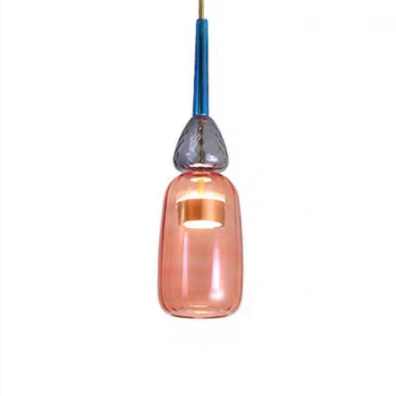 Tall pink glass cylinder pendant below grey bead