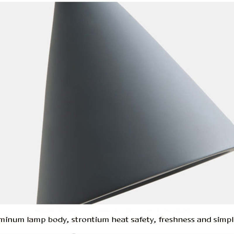 Close view of dark tapered metal shade