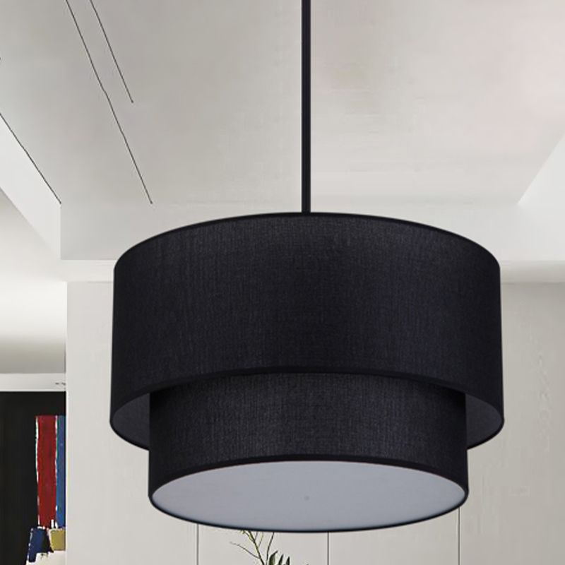 Black Renee dual-drum fabric pendant in a light-coloured interior.