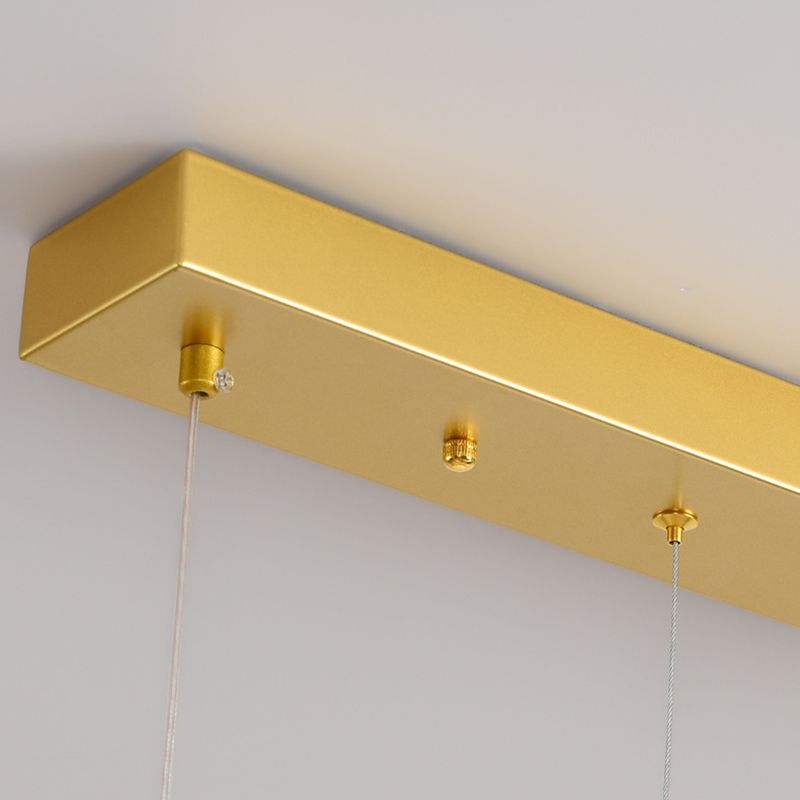 Gold rectangular ceiling rail with hanging cord fittings