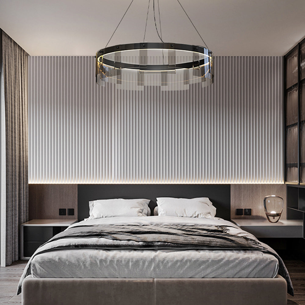 31.5-inch option over a bed with gray bedding and a fluted wall, with a separate bedside lamp