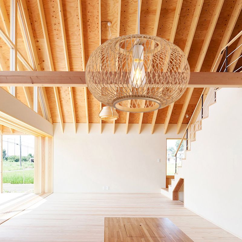 Ritta woven-look pendants in a large room with exposed wooden beams