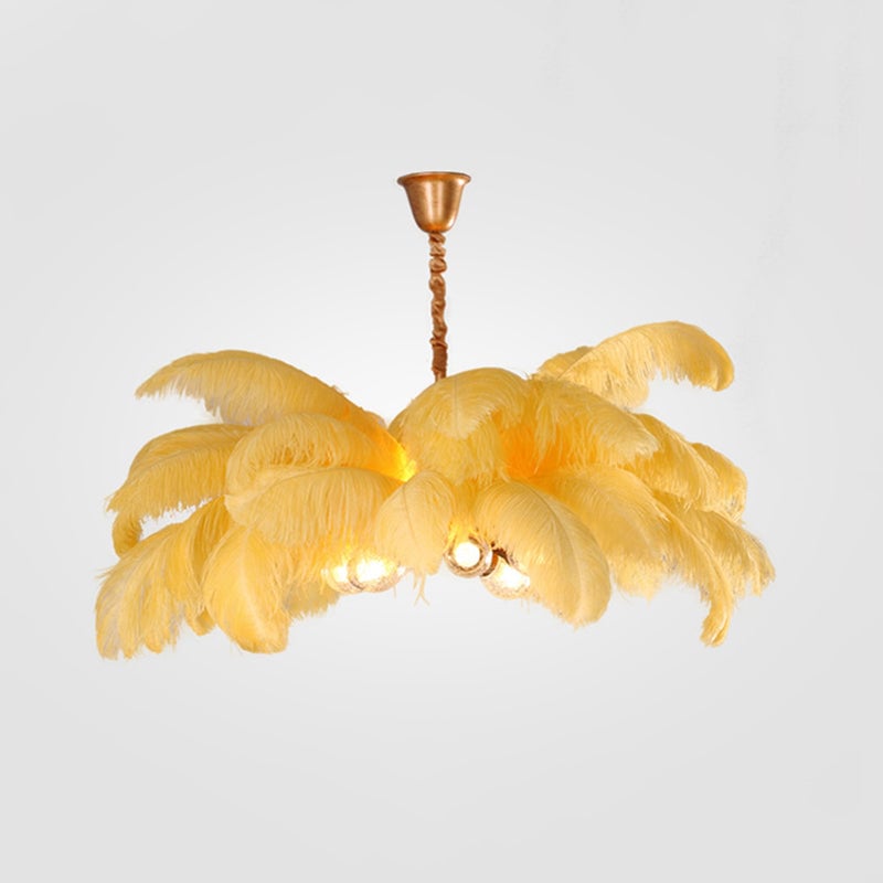 Yellow-feather O'Moore gallery view with gold-toned canopy, wrapped suspension and illuminated globes