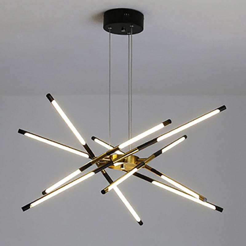 Black and Gold multi-rod Edge pendant isolated on grey, with black round canopy, gold hub and white illuminated sections