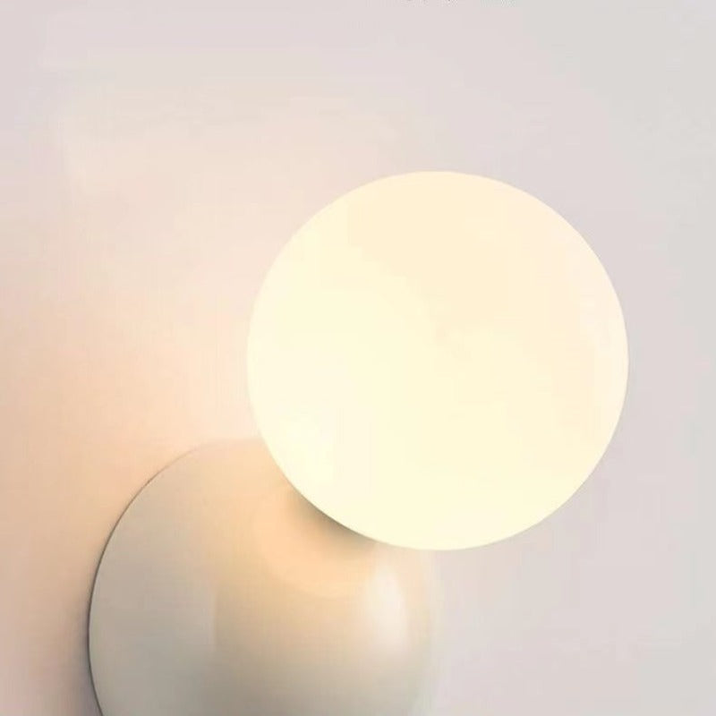 Close view of a glowing Valentina globe and white backplate
