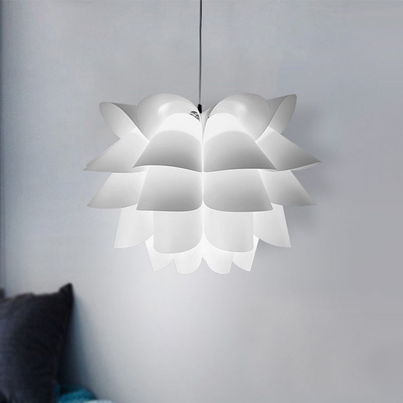 Cairns white acrylic petal pendant near a window