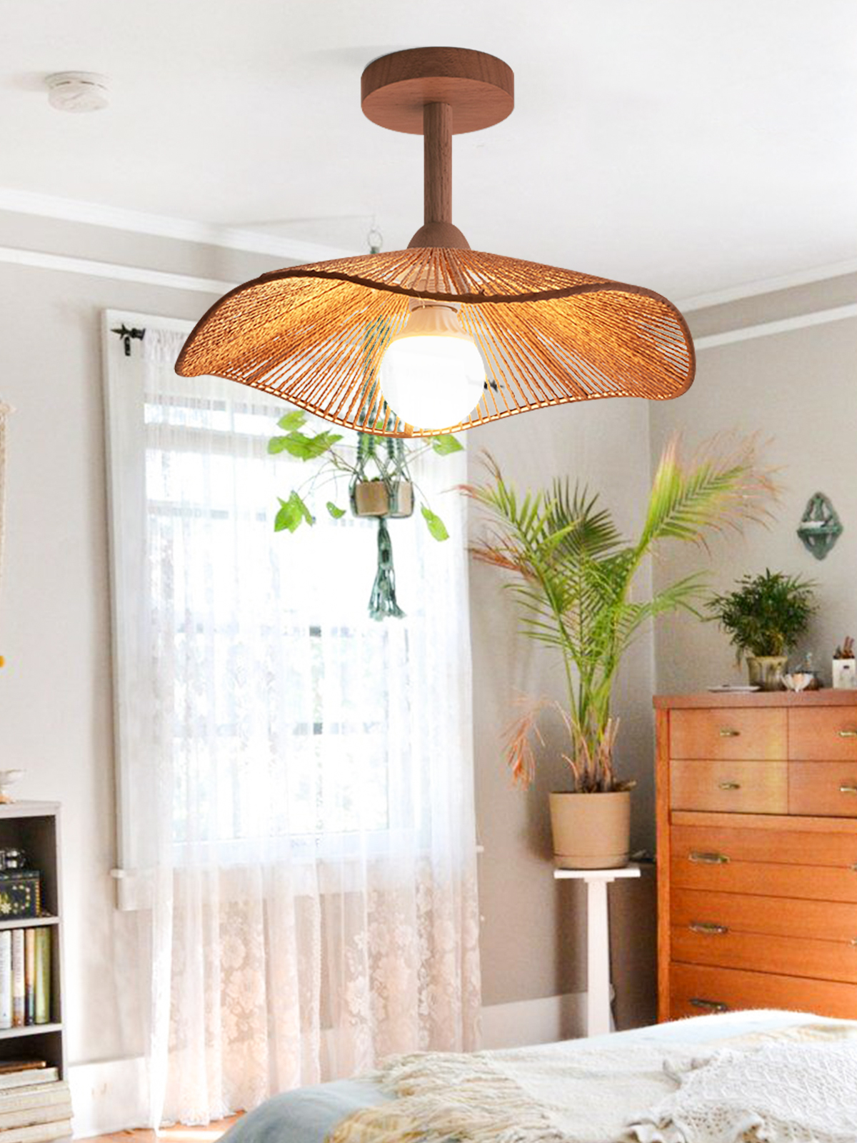 Wood Color Hazel ceiling lamp above a bed near a bright window and chest of drawers.
