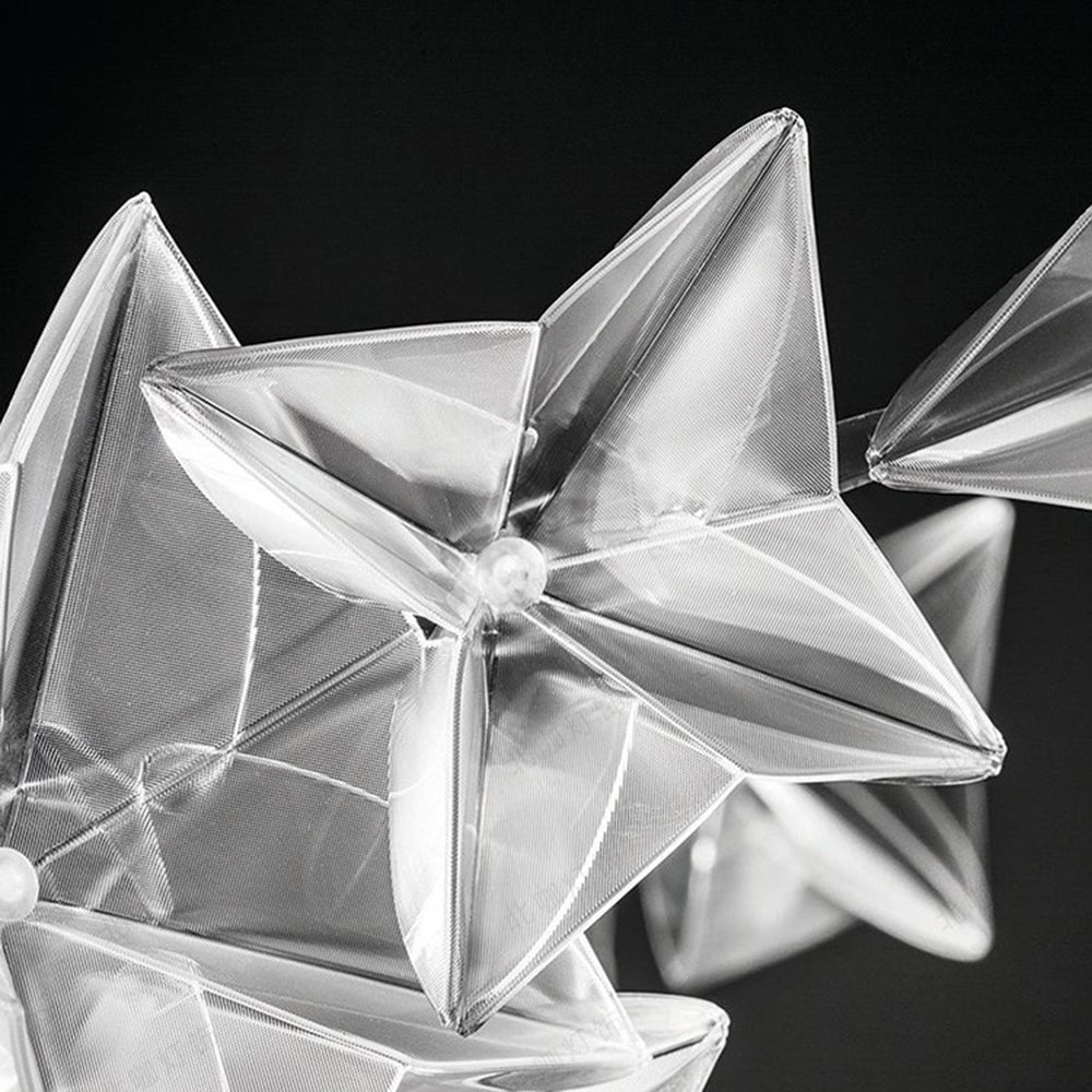 Folded transparent-looking star details on the Olivia pendant