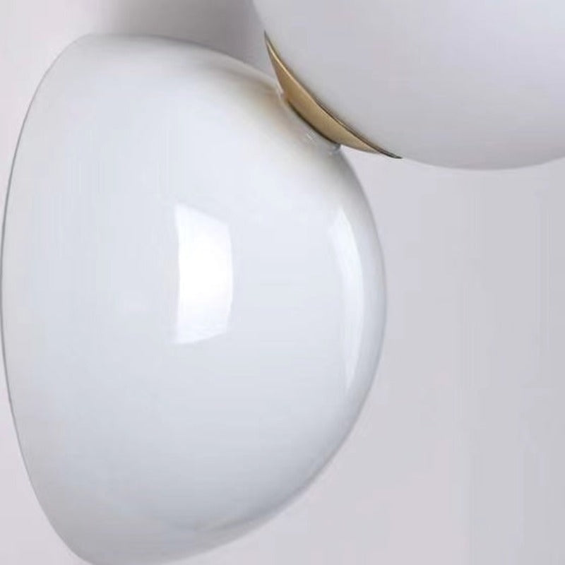 Close view of the Valentina white backplate and small gold-tone connector