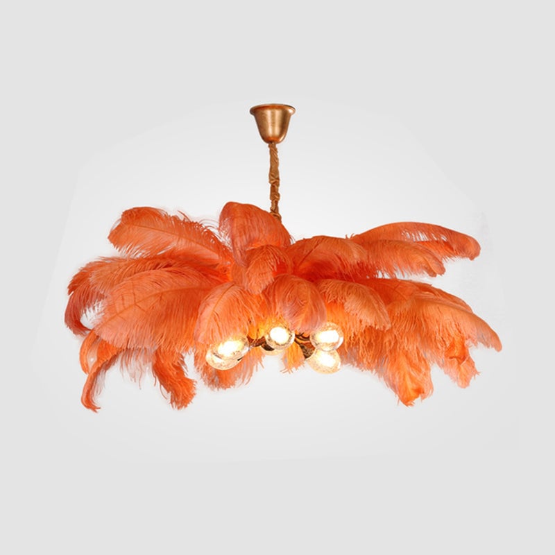 Orange O'Moore option with broad feather canopy, gold-toned cup canopy and lit globe-shaped elements below