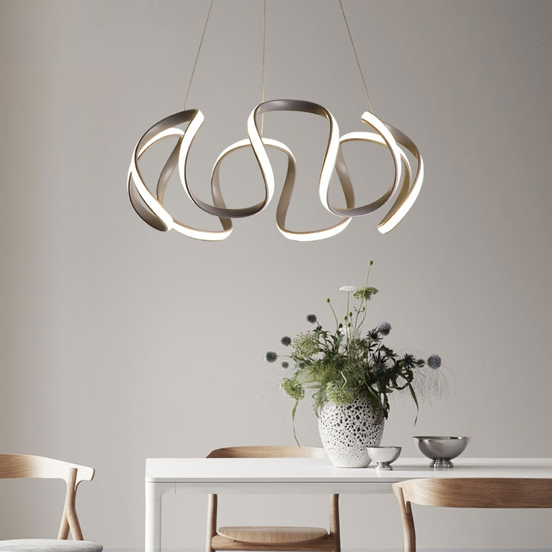 Gray six-head curved LED pendant above sideboard