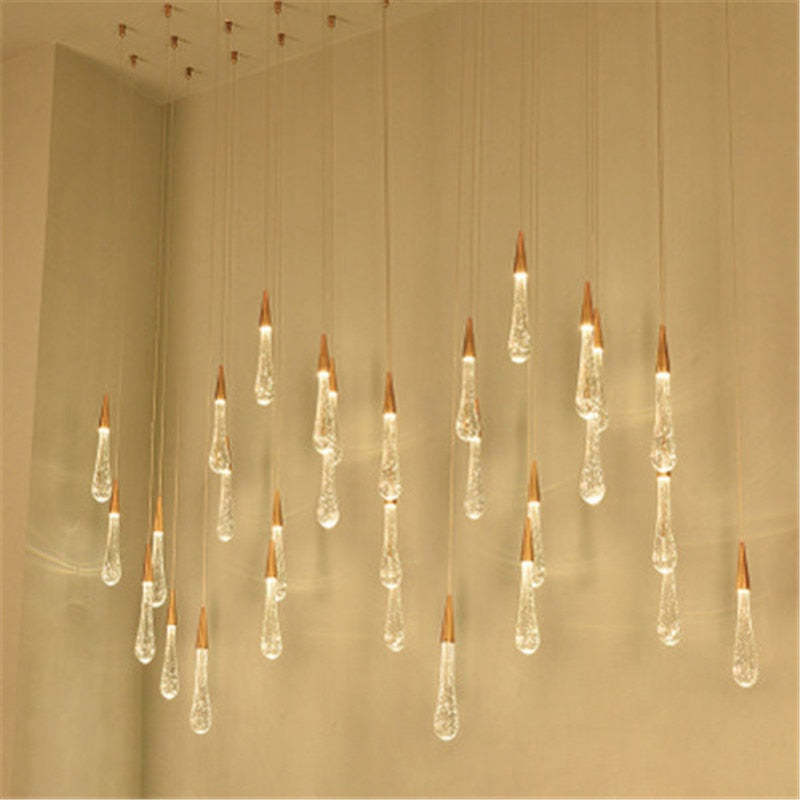 Large separately suspended crystal-drop installation in warm room