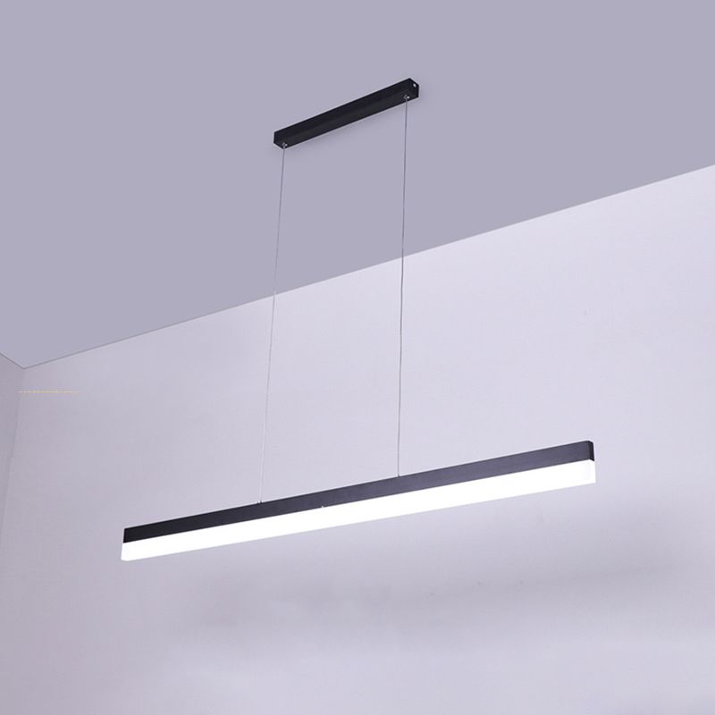 Illuminated black Edge bar with white diffuser suspended below a rectangular canopy.