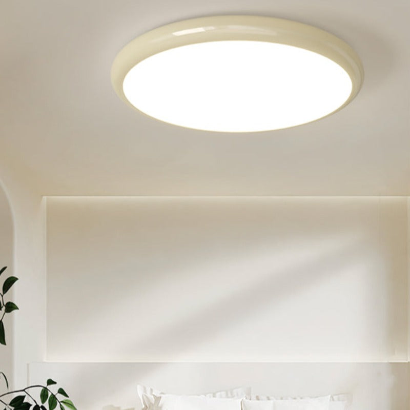 Ozawa Cream Yellow ceiling light in a pale room