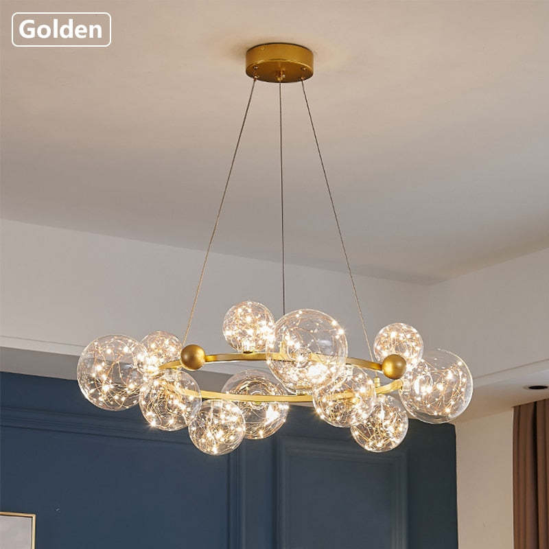 Close view of gold ring chandelier and round ceiling canopy