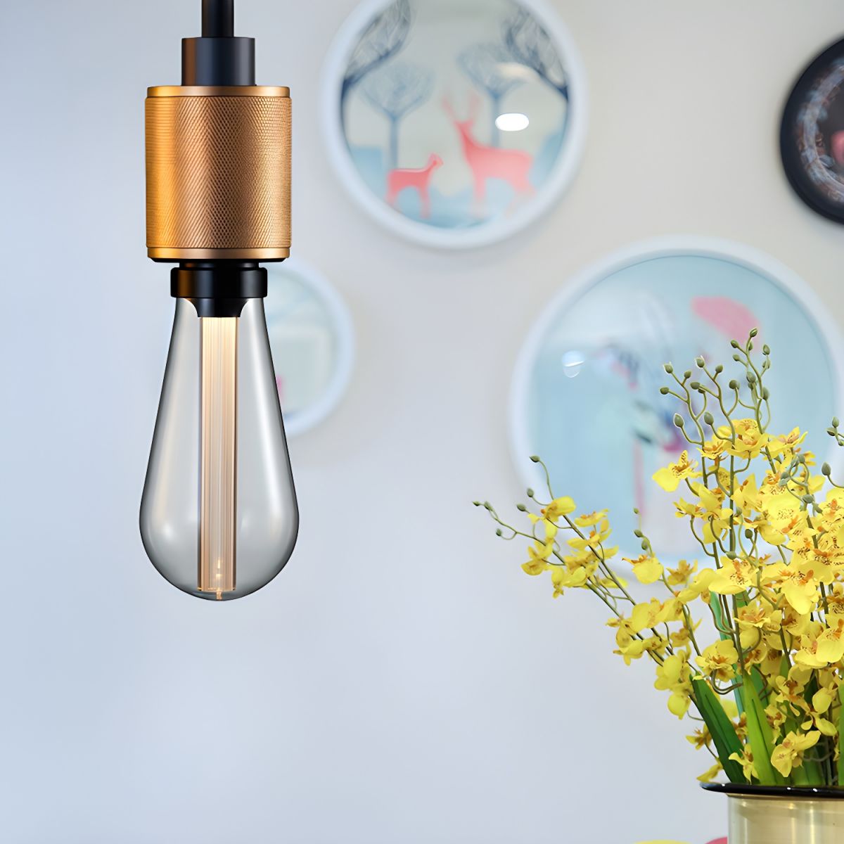 Cooley Gold pendant holder pictured near yellow flowers