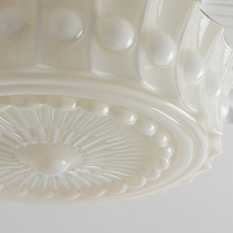 Circular relief motifs and floral glass underside detail