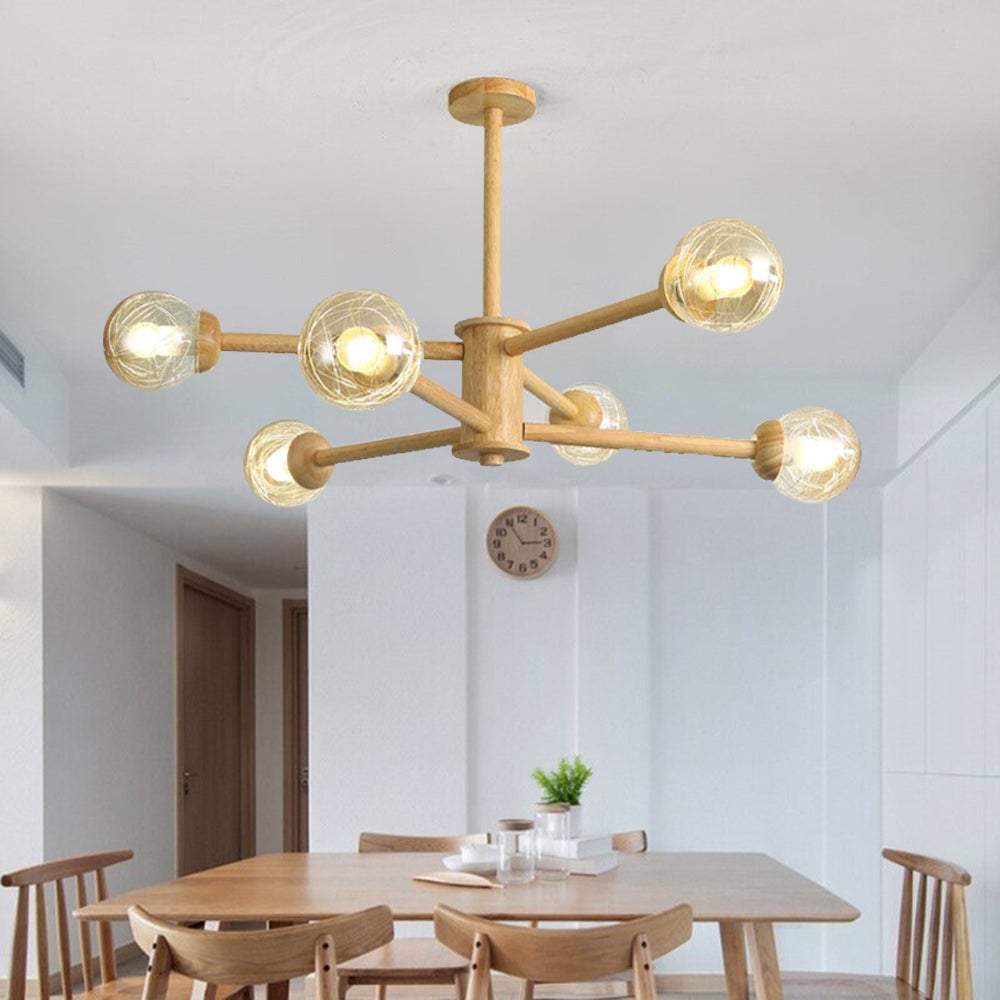 Ozawa 6Head bubble-glass pendant above a wooden dining table