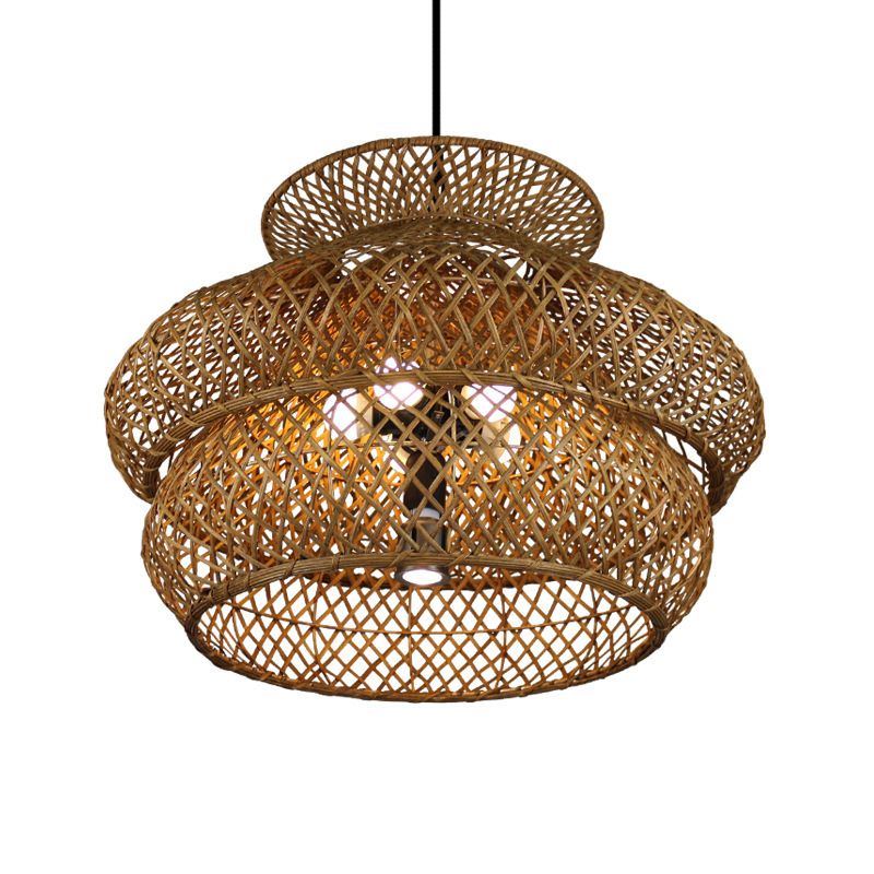 Ritta pendant with rounded overlapping woven sections, a small upper collar and a dark cord.