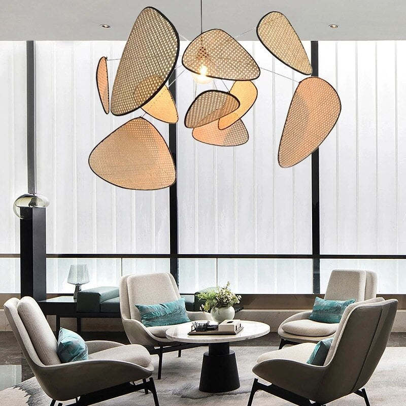 Woven leaf pendant above an upholstered seating group