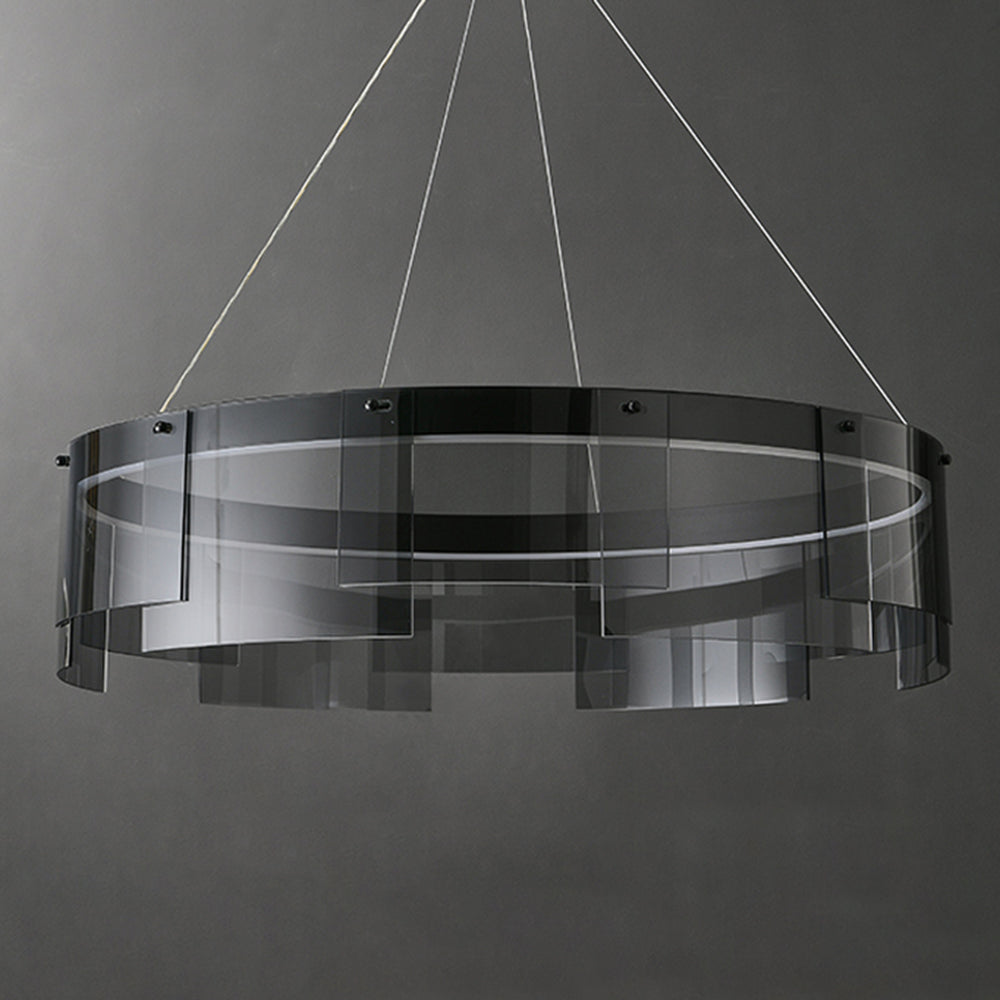 Unlit front detail of the black ring and layered translucent rectangular panels against dark gray